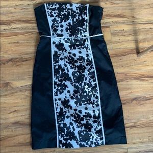 Black sleeveless flowered dress